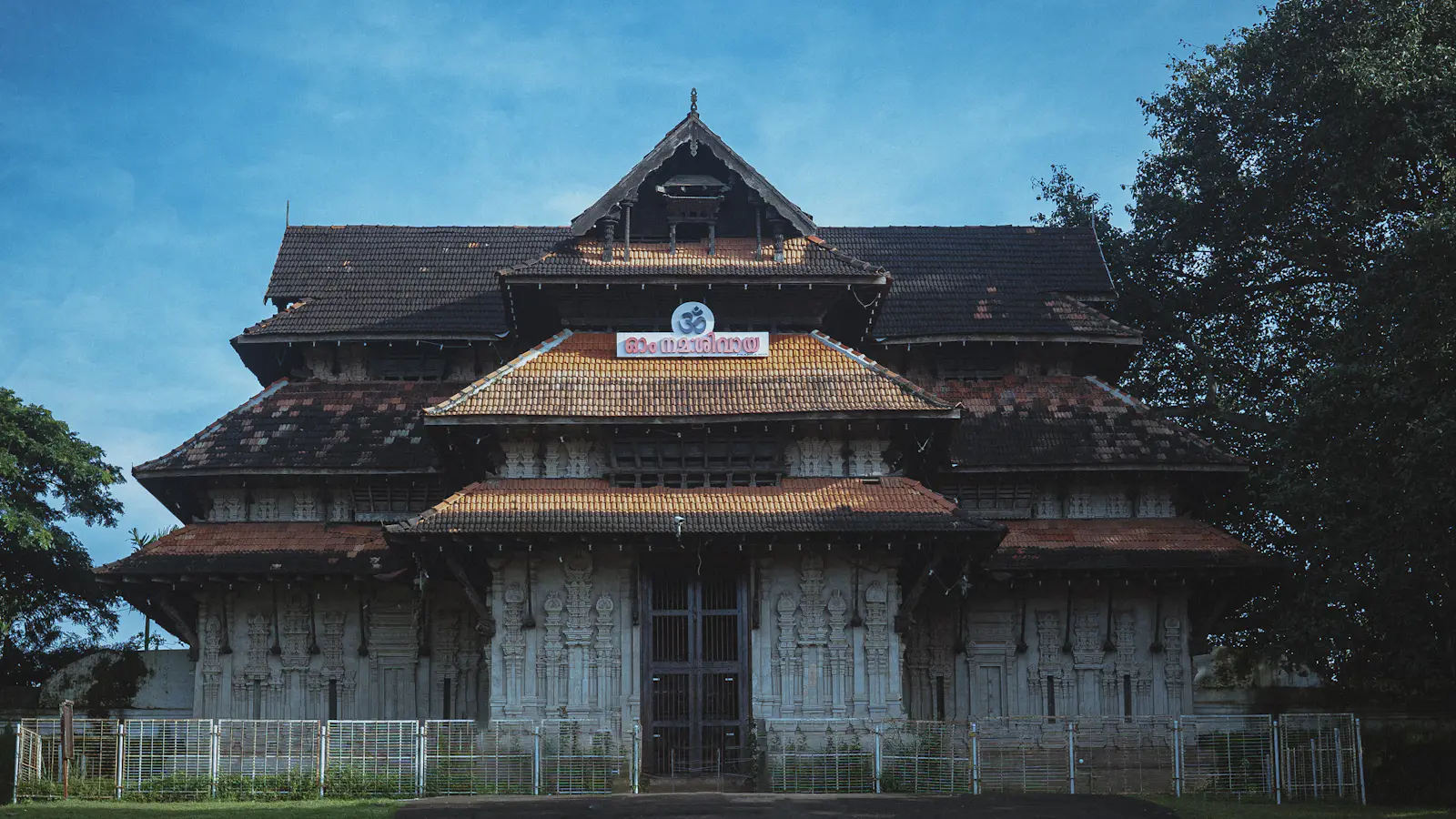 Traditional wooden building in Kerala, for a guide to distance education in Thrissur Traditional wooden building in Kerala, for a guide to distance education in Thrissur